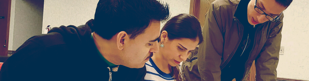 Three people reading